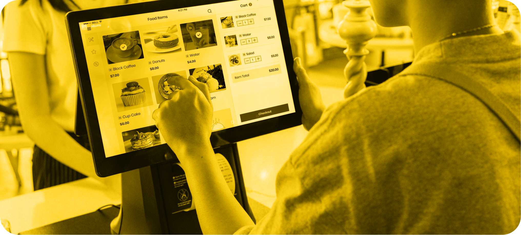 Staff using Kasheer POS terminal
